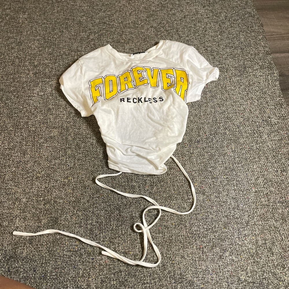 White crop top with the back out and adjustable strings